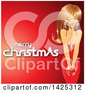 Clipart Of A Gorgeous Woman In A Red Dress Holding A Heart Over Red With Merry Christmas Text Royalty Free Vector Illustration
