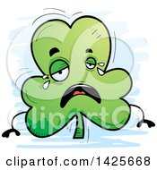 Clipart Of A Cartoon Doodled Crying Shamrock Clover Character Royalty Free Vector Illustration