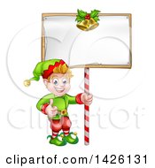 Poster, Art Print Of Cartoon Happy Male Christmas Elf Giving A Thumb Up And Holding A Blank Sign With Bells