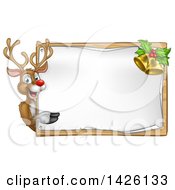 Poster, Art Print Of Happy Christmas Reindeer Pointing Around A Sign Board With Bells