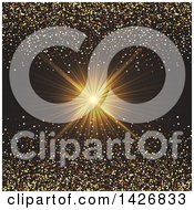 Golden Ray Burst With Confetti Glitter On Black