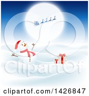 Poster, Art Print Of Happy Snowman With Gifts In The Snow Under A Silhouetted Santa Against A Full Moon