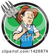 Retro Cartoon Male Farmer Or Worker Holding A Pitchfork Over His Shoulder Emerging From A Black White And Green Circle