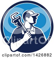 Poster, Art Print Of Retro Male Plumber Holding A Monkey Wrench Over His Shoulder In A Blue And White Circle