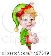 Poster, Art Print Of Happy Caucasian Male Christmas Elf Giving A Thumb Up Around A Sign