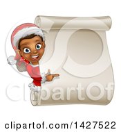 Poster, Art Print Of Happy Black Female Christmas Elf Pointing Around A Blank Scroll Sign