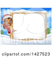 Poster, Art Print Of Happy Black Female Christmas Elf Pointing Around A Blank Sign In A Winter Landscape