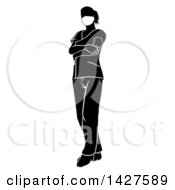 Clipart Of A Black And White Silhouetted Female Nurse Doctor Or Surgeon In Scrubs Standing With Folded Arms Royalty Free Vector Illustration
