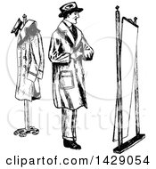 Clipart Of A Vintage Black And White Sketched Man Trying On A Coat Royalty Free Vector Illustration