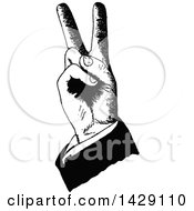 Clipart Of A Vintage Black And White Sketched Hand Making Bunny Ears Or Gesturing Peace Or Victory Royalty Free Vector Illustration