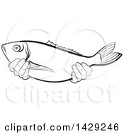 Poster, Art Print Of Black And White Hands Holding A Fish