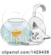 Cat Playing With A Goldfish In A Bowl