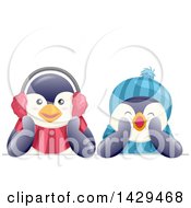 Poster, Art Print Of Cute Penguins Wearing A Hat And Ear Muffs
