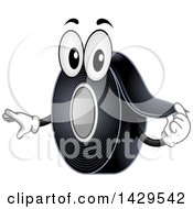 Clipart Of A Roll Of Black Electrical Tape Mascot Royalty Free Vector Illustration by BNP Design Studio