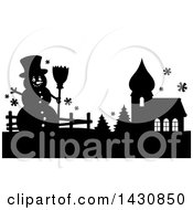 Clipart Of A Black And White Silhouetted Christmas Snowman By A Church Royalty Free Vector Illustration