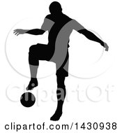 Poster, Art Print Of Black Silhouetted Male Soccer Player In Action