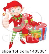 Poster, Art Print Of Happy Christmas Elf Giving A Thumb Up By Gifts