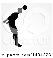 Poster, Art Print Of Black Silhouetted Male Soccer Player Heading A Ball Outlined In White Over Gray