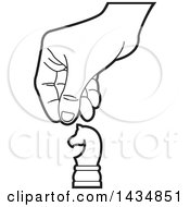 Clipart Of A Black And White Hand Moving A Knight Chess Piece Royalty Free Vector Illustration