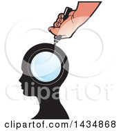 Poster, Art Print Of Hand Holding A Magnifying Glass Over A Silhouetted Head