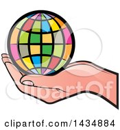 Poster, Art Print Of Hand Holding A Colorful Grid Globe