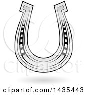 Clipart Of A Floating Horseshoe And Shadow Royalty Free Vector Illustration by cidepix
