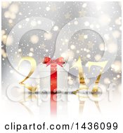 Clipart Of A Gold New Year 2017 With A Gift Over Bokeh And Stars Royalty Free Vector Illustration