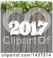 Poster, Art Print Of New Year 2017 Design With Numbers Hanging From Branches With Snowflakes Over Wood