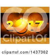 Clipart Of A New Year 2017 Design With A Bauble And Golden Flares Royalty Free Vector Illustration