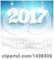 Clipart Of A New Year 2017 Design Suspended Over A Winter Landscape Royalty Free Vector Illustration