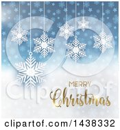 Clipart Of A Gold Merry Christmas Greeting Over Blue And White With Stars And Snowflakes Royalty Free Vector Illustration
