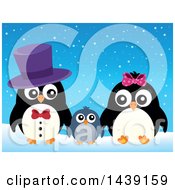 Clipart Of A Penguin Family In The Snow Royalty Free Vector Illustration