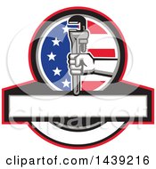 Clipart Of A Retro Plumber Hand Holding A Pipe Monkey Wrench In An American Circle Over A Banner With Copy Space Royalty Free Vector Illustration