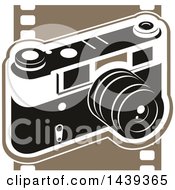 Clipart Of A Camera And Film Strip Royalty Free Vector Illustration