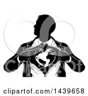 Poster, Art Print Of Black And White Silhouetted Strong Business Man Super Hero Ripping Off His Suit And Revealing A Heart Earth