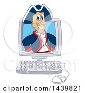 Clipart Of A Patriot School Mascot Character Emerging From A Computer Screen Royalty Free Vector Illustration