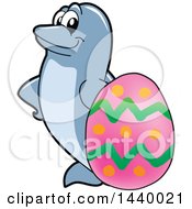 Clipart Of A Porpoise Dolphin School Mascot Character With An Easter Egg Royalty Free Vector Illustration by Toons4Biz