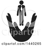 Clipart Of A Black And White Business Man Over Hands Royalty Free Vector Illustration