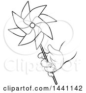 Black And White Lineart Childs Hand Holding A Spinning Pinwheel