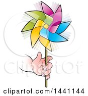 Clipart Of A Childs Hand Holding A Colorful Spinning Pinwheel Royalty Free Vector Illustration by Lal Perera