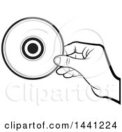 Clipart Of A Black And White Hand Holding A Cd Or Dvd Royalty Free Vector Illustration by Lal Perera