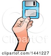 Hand Holding A Floppy Disk