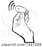 Black And White Hand Holding A Computer Wireless Usb Modem
