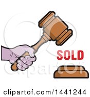 Hand Banging An Auction Gavel With Sold Text