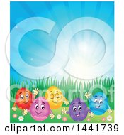 Poster, Art Print Of Group Of Happy Easter Eggs In Grass Against Sunshine