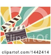 Retro Flat Styled Clapperboard Over Rays