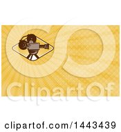 Clipart Of A Retro Film Movie Camera And Orange Rays Background Or Business Card Design Royalty Free Illustration