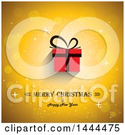 Poster, Art Print Of Merry Christmas And Happy New Year Greeting With A Red Gift On A Golden Background