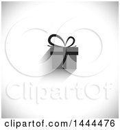 Clipart Of A Grayscale Gift On A Shaded Background Royalty Free Vector Illustration