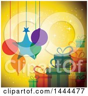 Clipart Of Christmas Ornaments Hanging Over Gifts Royalty Free Vector Illustration